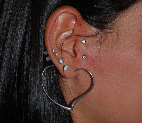 Heart Stud Lobe And Surface Tragus Piercing For Girls