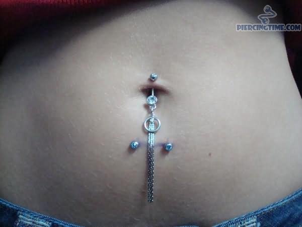 Horizontal Navel Piercing With Gem Studs