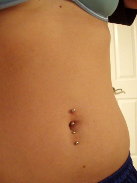 Inverse Belly Piercing With Silver Barbell