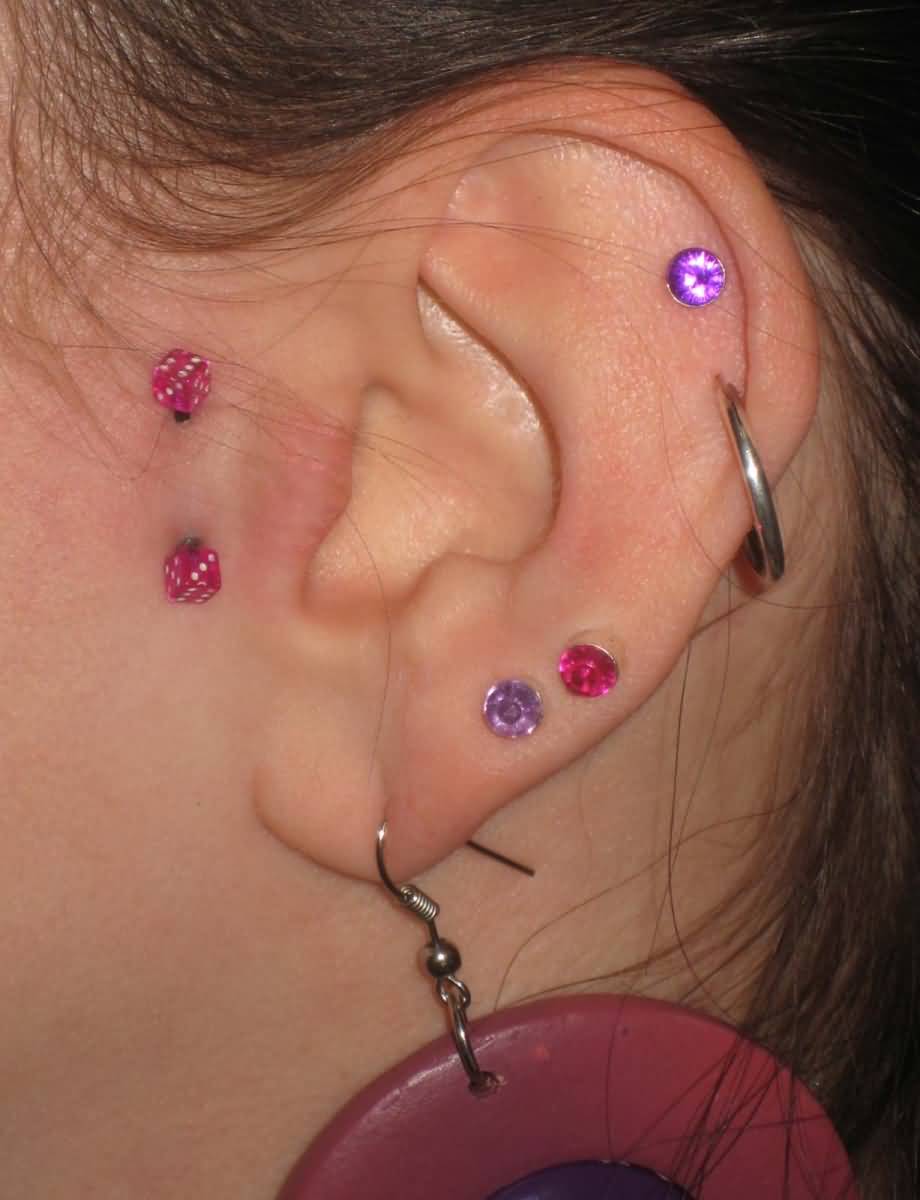 Surface Tragus Piercing With Dice Barbell