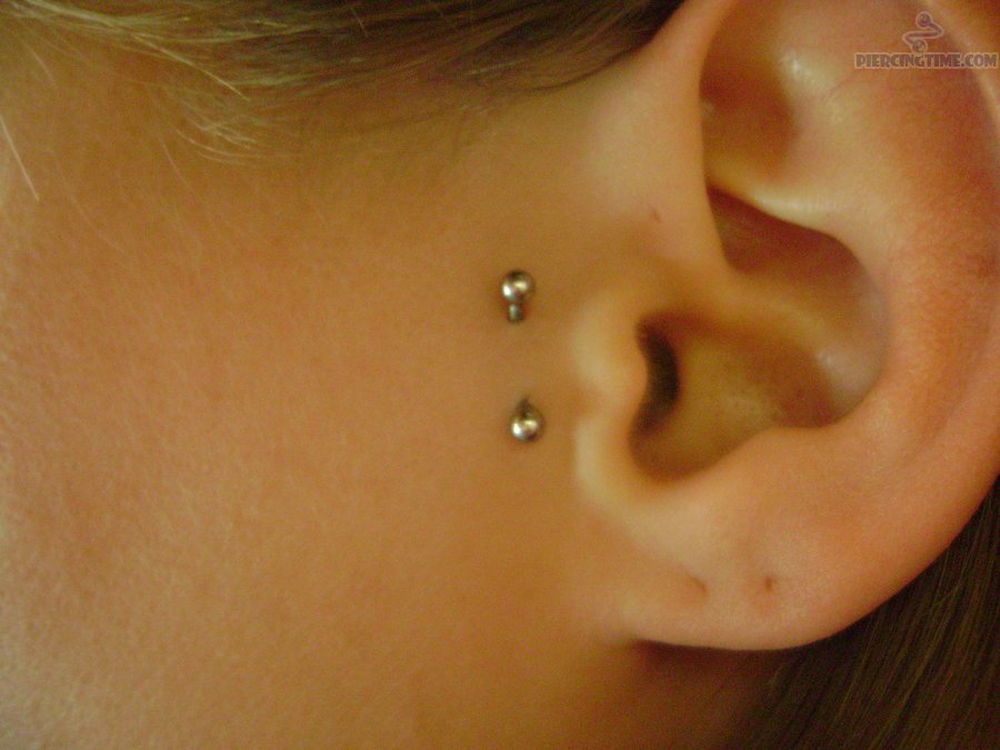 Surface Tragus Piercing With Silver Curved Barbell