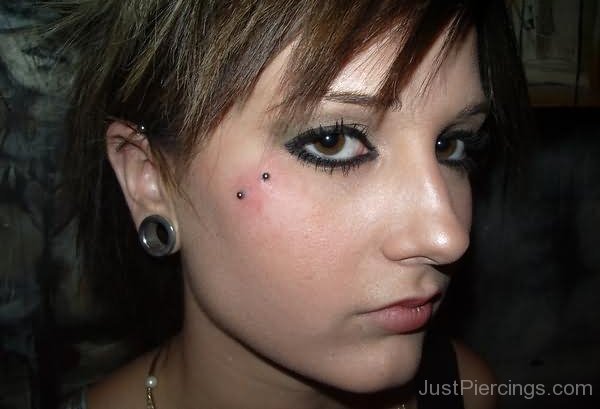 Anti Eyebrow And Stretched Lobe Piercing