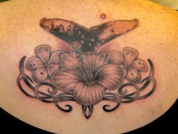 Awesome Grey Whale Tail With Flowers Tattoo For Women