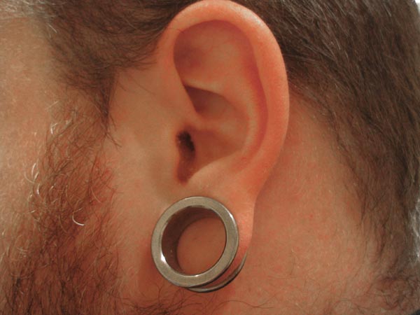 Awesome Stretched Lobe Piercing On Left Ear