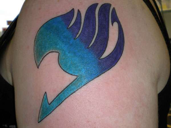 Blue And Purple Fairy Tail Tattoo On Left Shoulder