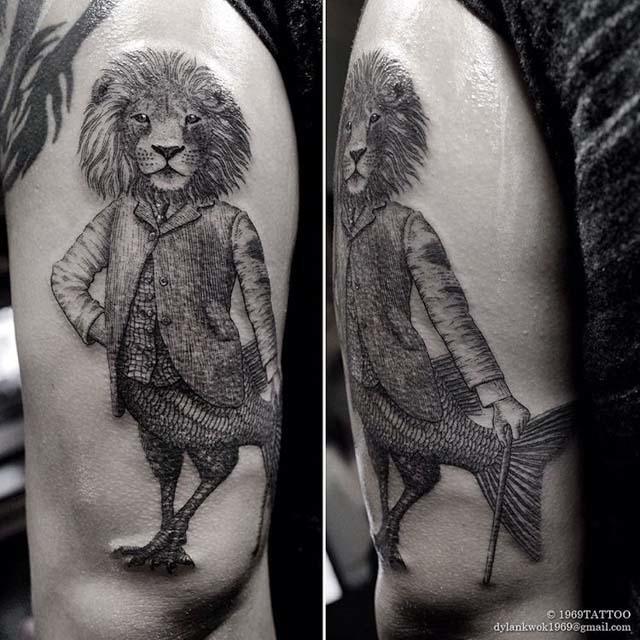 Creative Lion With Fish Tail Tattoo On Sleeve