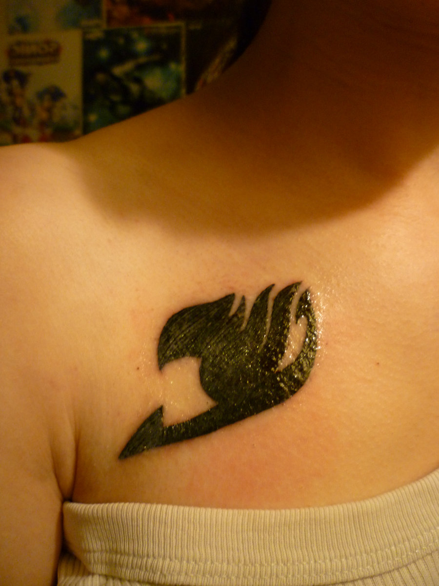 Dark Black Fairy Tail Tattoo On Girl Chest