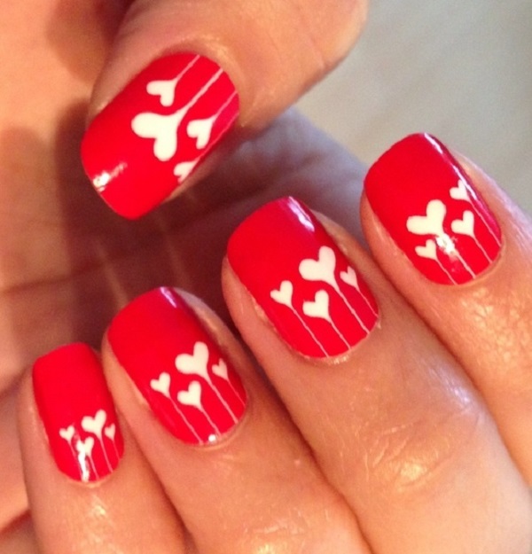 Red Nails With White Hearts Nail Art Design