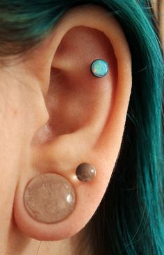 Stretched Lobe Piercing On Girl Left Ear