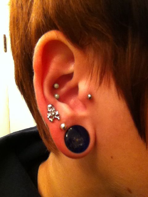 Stretched Lobe Piercing On Right Ear For Girls