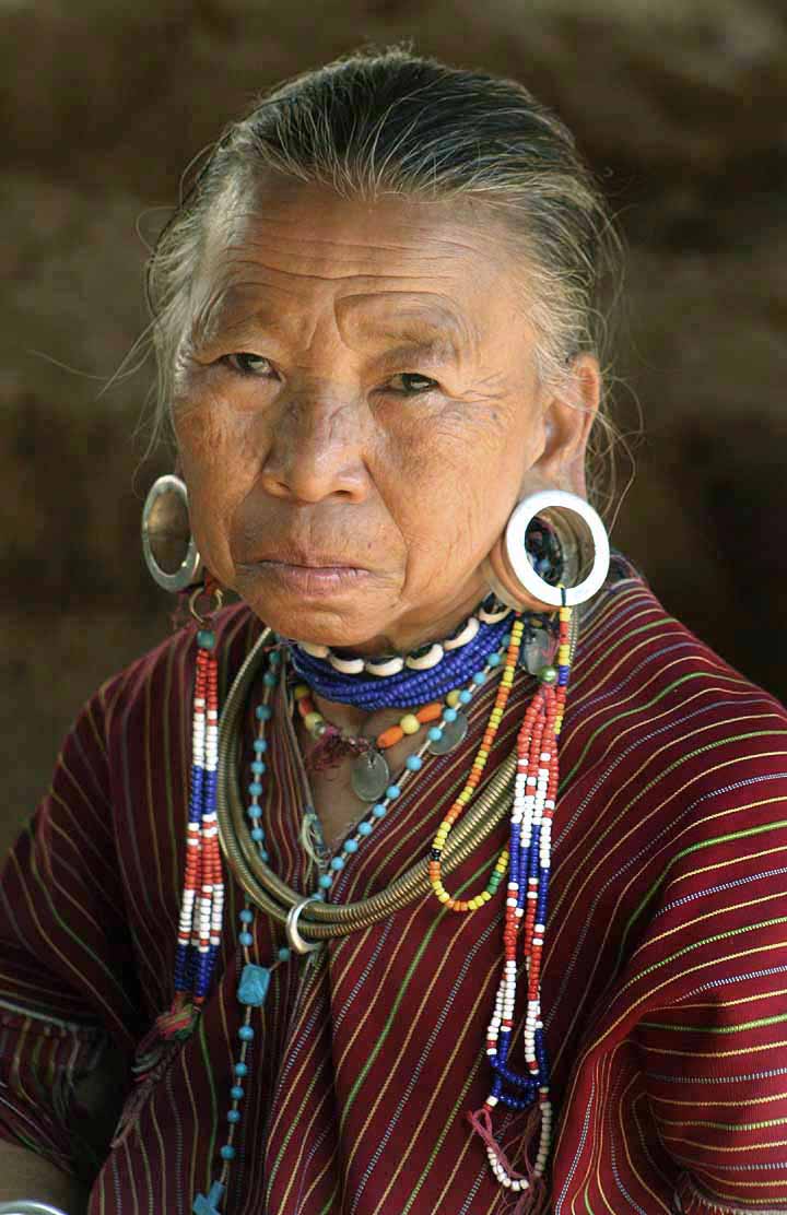 Woman With Stretched Lobe Piercings