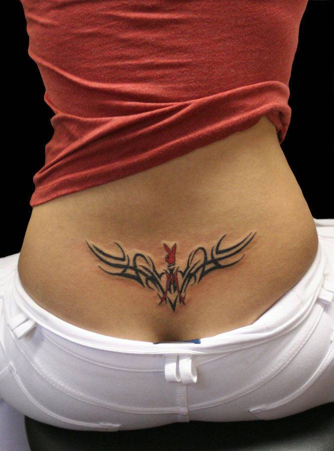 Cool Tribal Bunny Tattoo On Tailbone