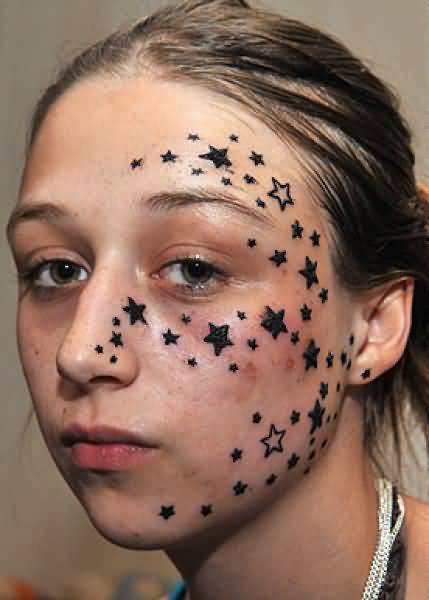 Extreme Black Stars Tattoo On Girl Face