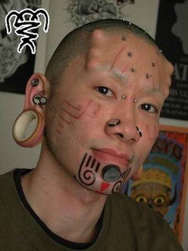 Extreme Body Modification Tattoo