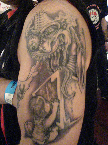 Extreme Demon With Child Tattoo On Half Sleeve