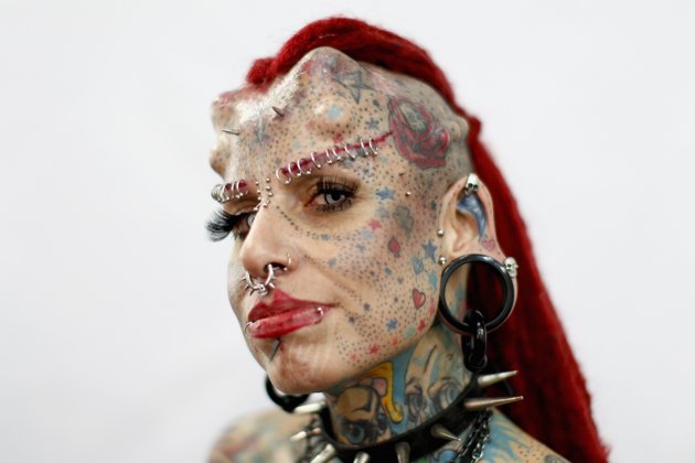 Extreme Piercing Tattoo For Women