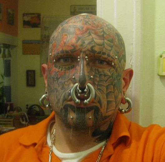 Extreme Tattoo And Piercing On Face