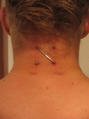 Girl Back Neck Pocketing Piercing