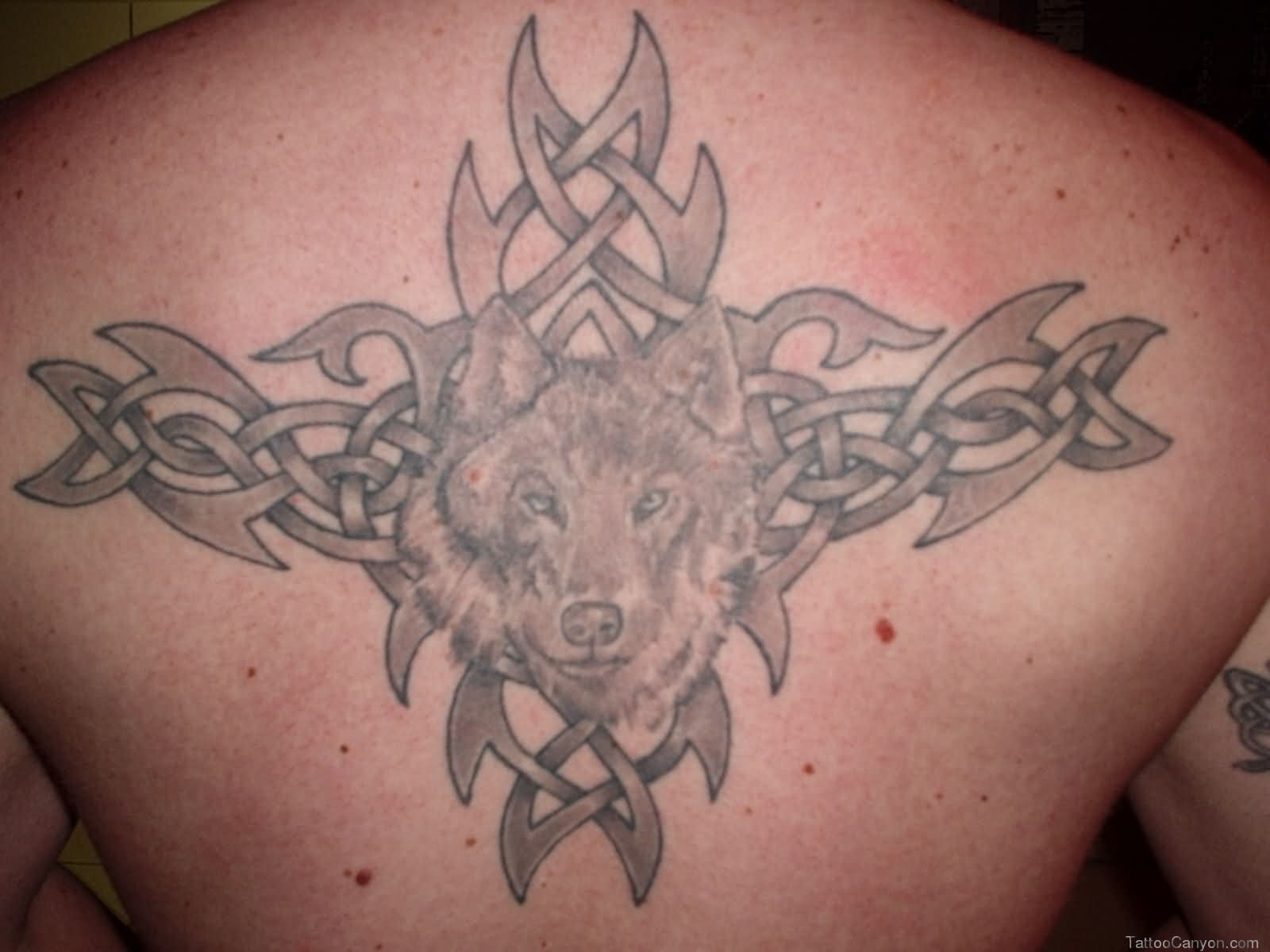 Grey Ink Tribal And Wolf Head Occupation Tattoo