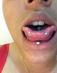 Lower Lip And Tongue Rim Piercing Picture