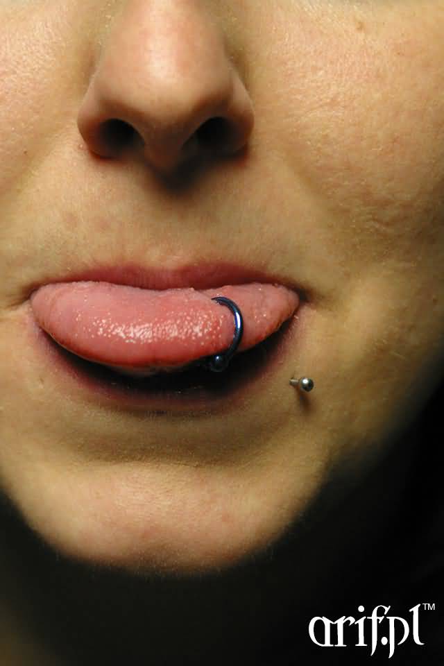 Lower Lip And Tongue Rim Piercing