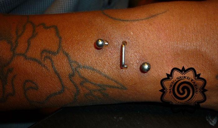 Pocketing Piercing On Right Arm