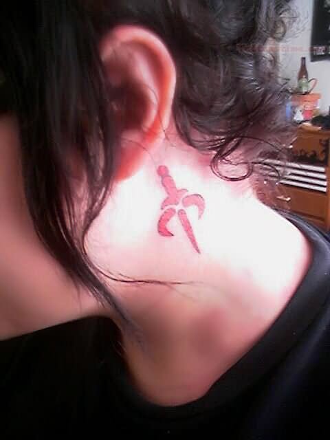 Red Ink Taarna Dagger Tattoo On Girl Neck