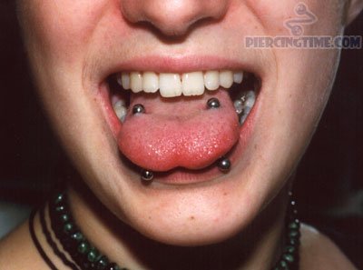 Tongue Rim Piercing With Silver Barbells