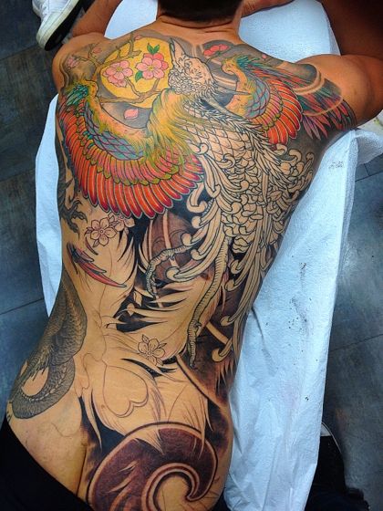 Flying Phoenix Tattoo On Full Back by Ami James