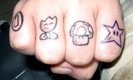 Cute Nintendo Knuckle Tattoo