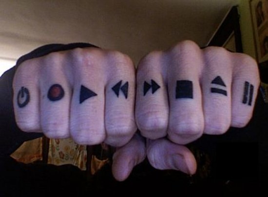 Knuckle Computer Inspired Symbol Tattoo