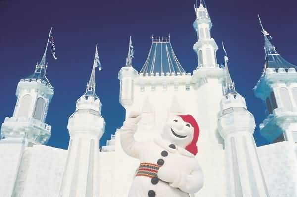 Snowman In Front Of Ice Palace During Quebec Winter Carnival