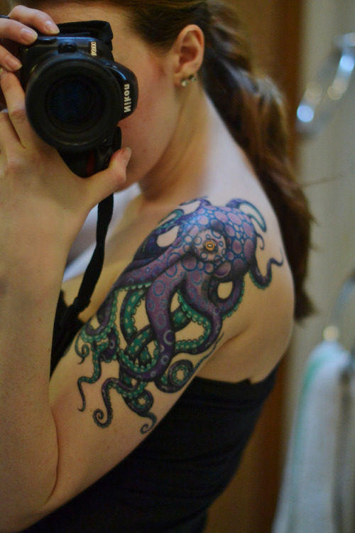 Awesome Octopus Tattoo On Girl Left Half Sleeve