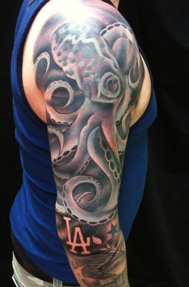 Black And Grey Octopus Tattoo On Man Right Half Sleeve