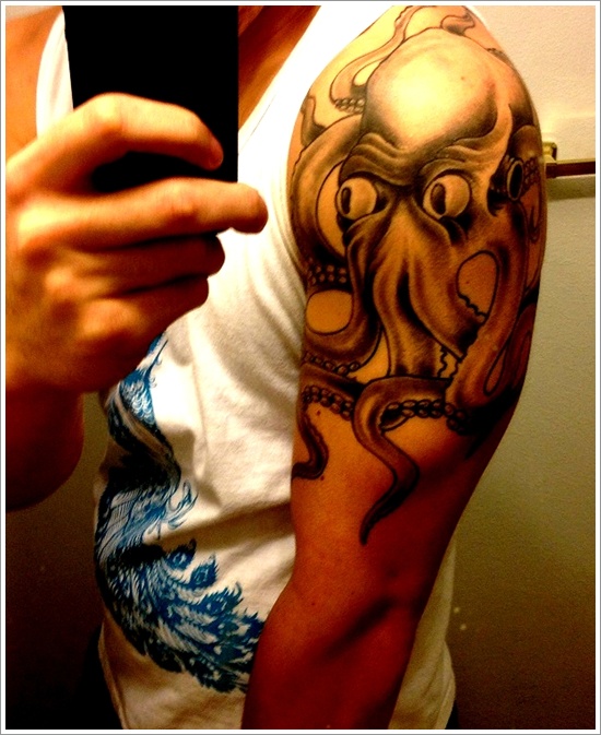 Classic Black Ink Octopus Tattoo On Man Left Half Sleeve