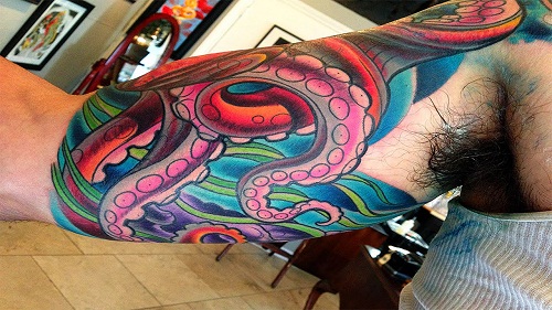 Colorful Octopus Tattoo On Man Right Half Sleeve