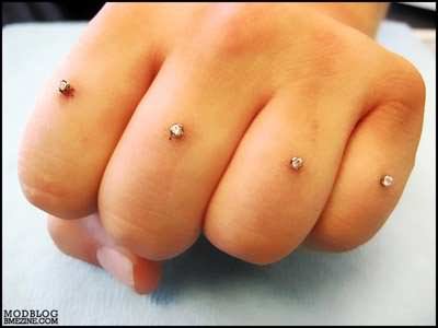 Dermal Anchors Finger Ring Piercings On Left Hand