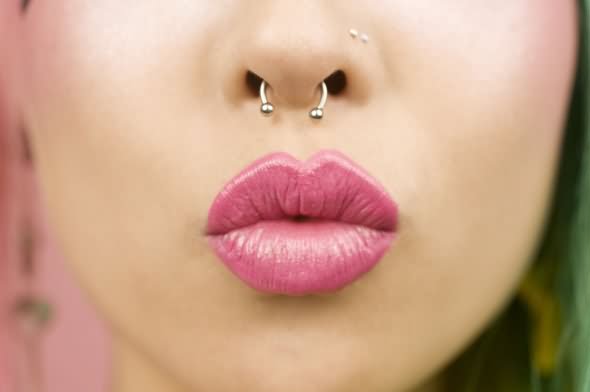 Dual Nose And Septum Beat Piercing