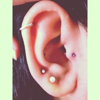 Lobe And Tragus Beat Piercing