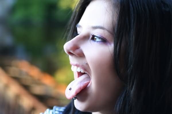 Teen With Tongue Beat Piercing