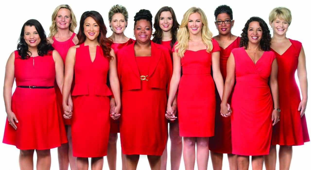 Group Of Women In Red Dresses Celebrating Wear Red Day