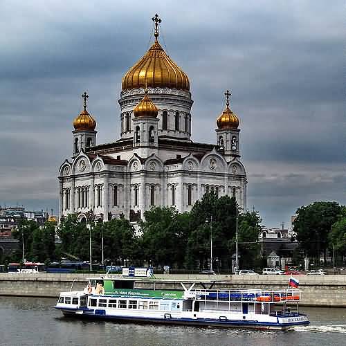 Ferry In Moskov River In Front Of Cathedral Of Christ The Saviour