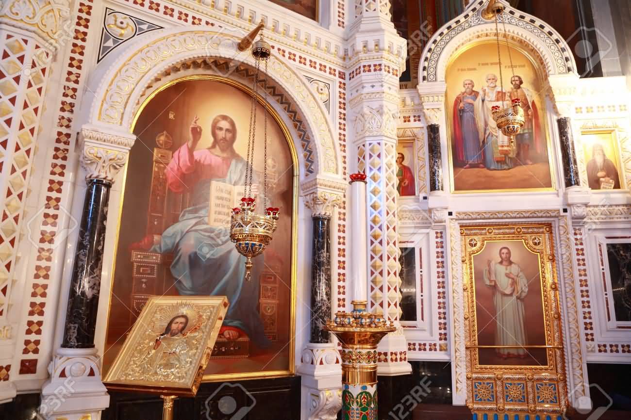 Icons And Stand For Candles Near Painting In Arch Inside The Cathedral Of Christ The Saviour