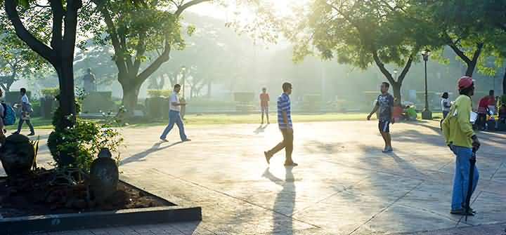 People Take Morning Walk At Rizal Park In Manila