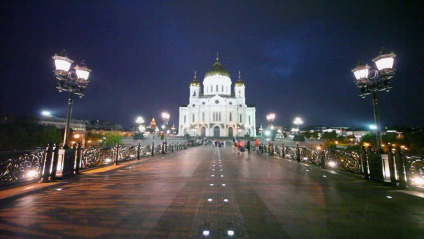 People Walk By Road Near Cathedral Of Christ The Saviour At Night