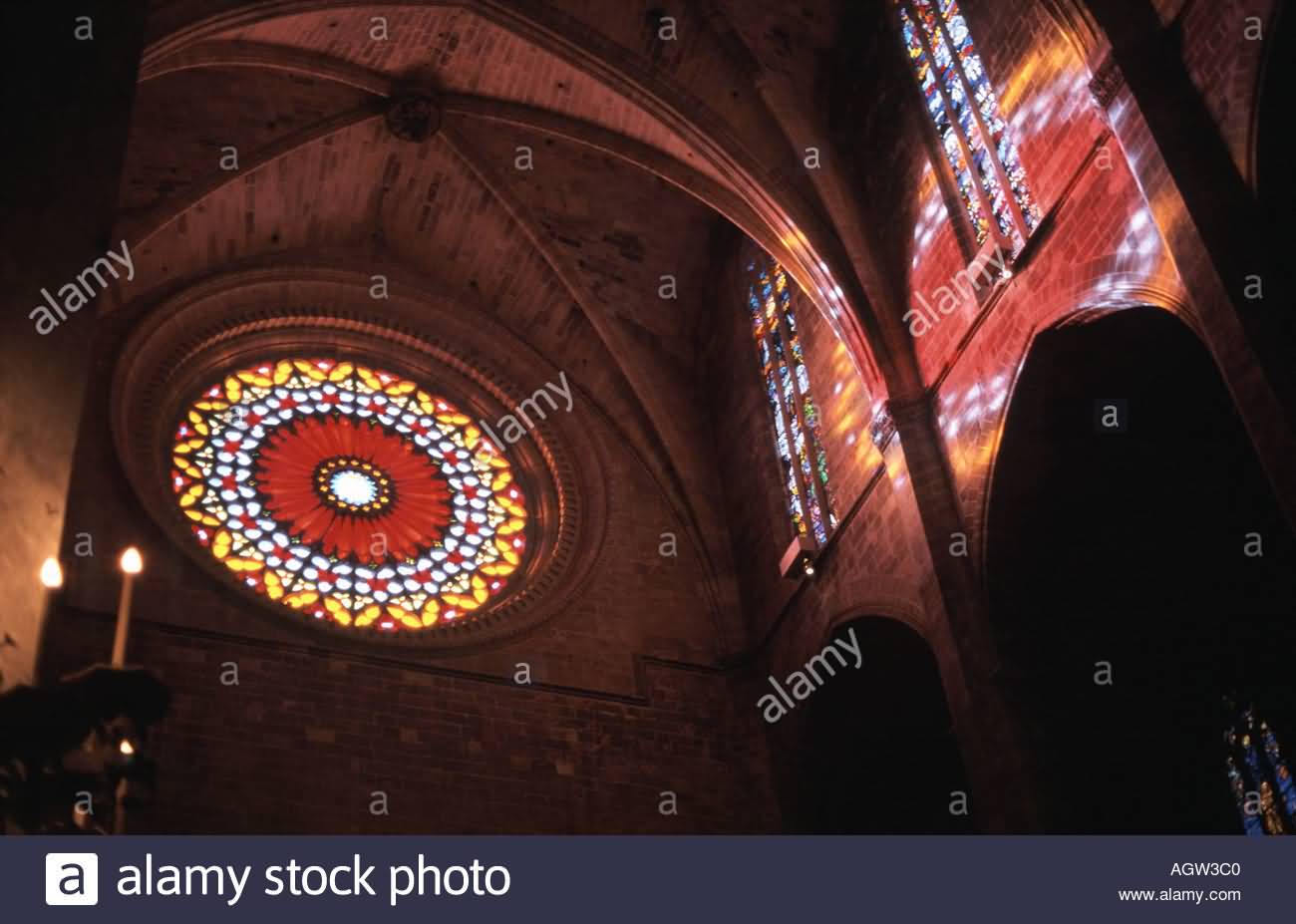 Round Stained Glass Window And Light Beam Inside The Palma Cathedral