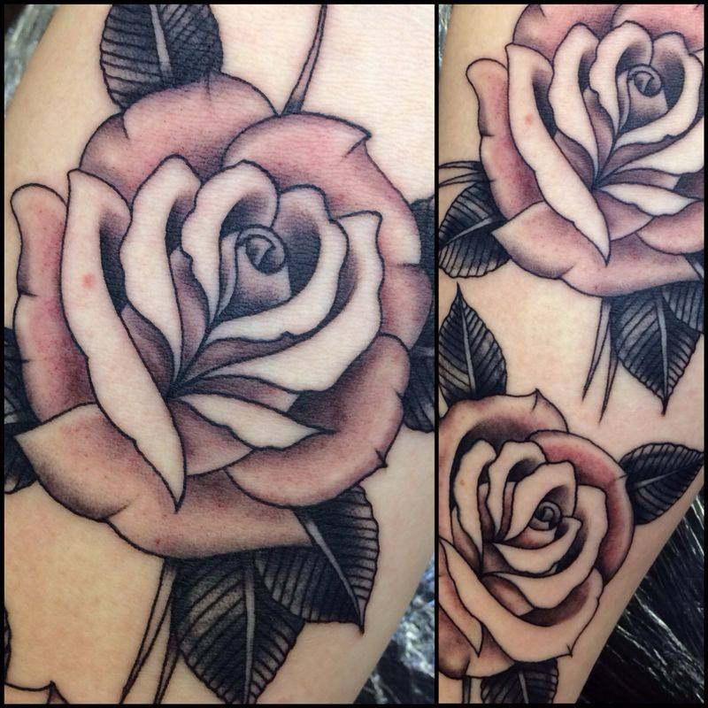 Black Ink Roses Tattoo On Left Half Sleeve