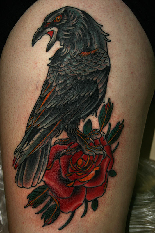 Red Rose And Crow Tattoo On Left Bicep