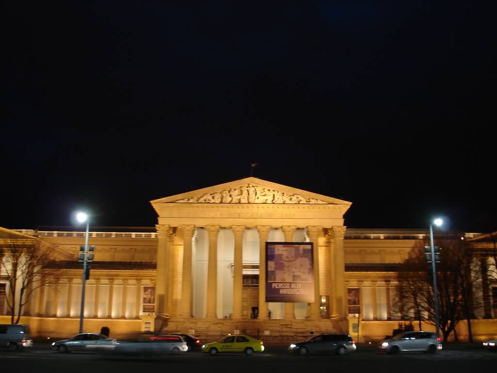 Traffic Passes In Front Of The Hungarian National Museum At Night