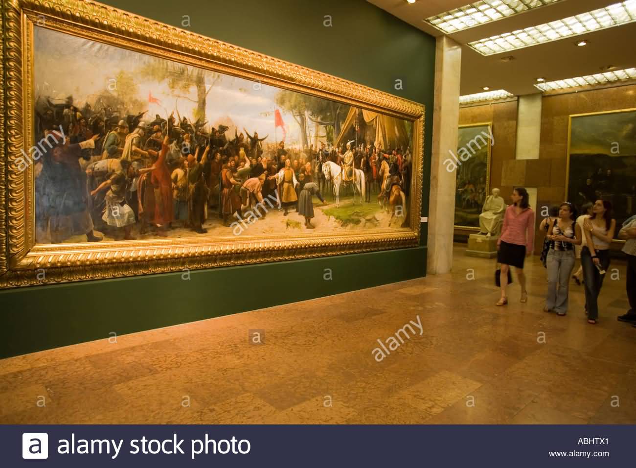 Visitors Looking At A Painting Inside The Hungarian National Museum In Budapest, Hungary